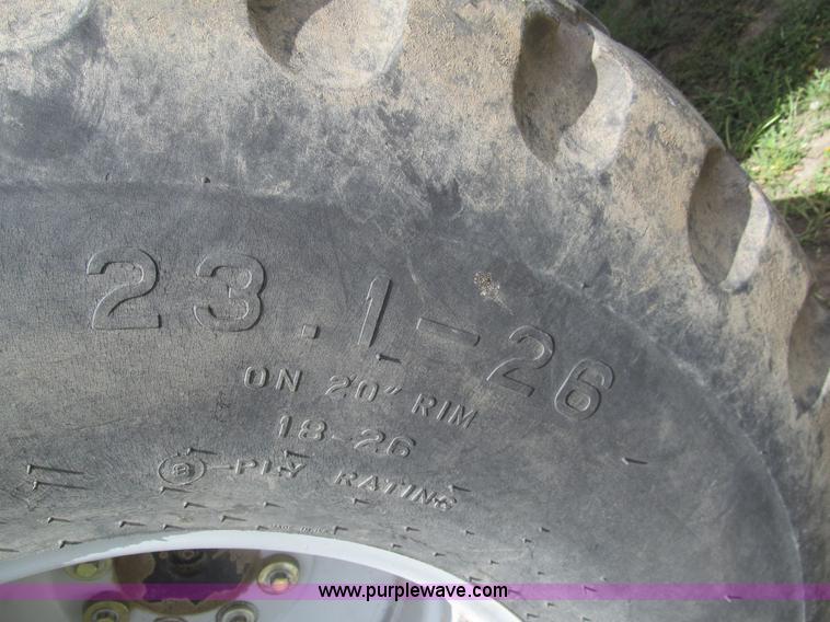 image for item I7032 2003 Hesston 8550S swather