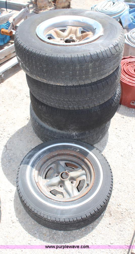 image for item AM9294 (5) 215/75R14 tires and wheels