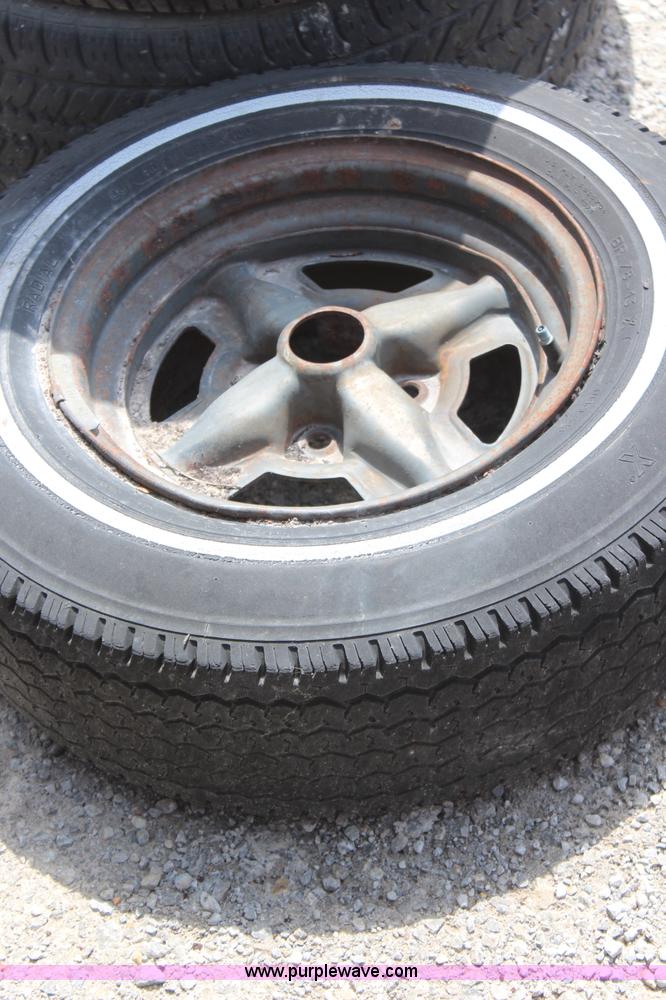 image for item AM9294 (5) 215/75R14 tires and wheels