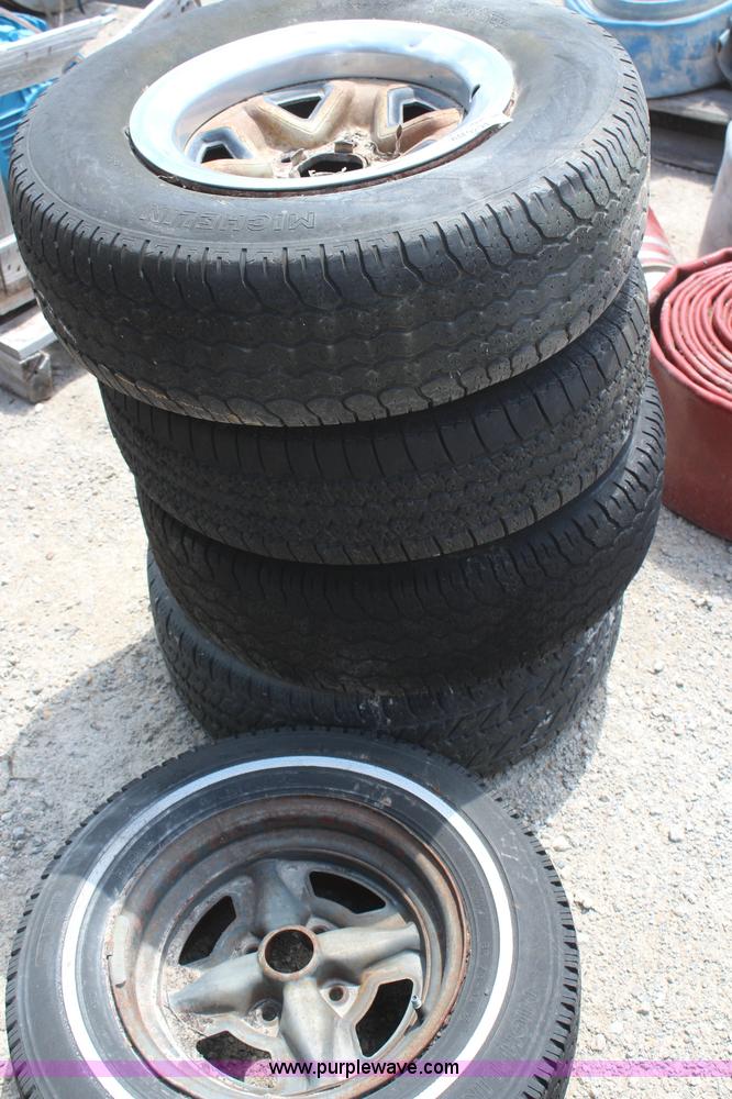 image for item AM9294 (5) 215/75R14 tires and wheels