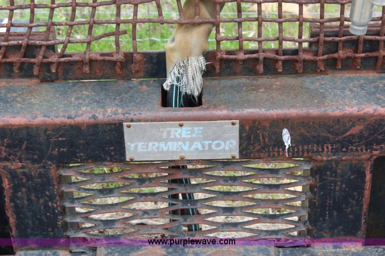 image for item H2660 Tree Terminator tree shear skid steer attachment