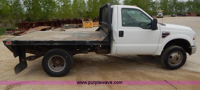 image for item H3400 2008 Ford F350 Super Duty XL flatbed pickup truck