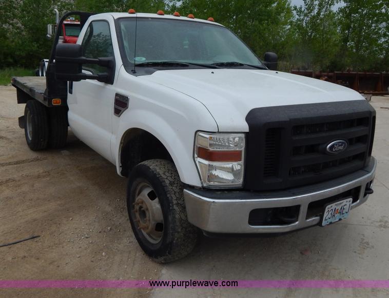 image for item H3400 2008 Ford F350 Super Duty XL flatbed pickup truck