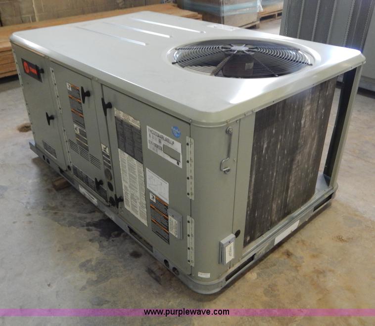 image for item H3419 Trane three ton rooftop AC and heating unit