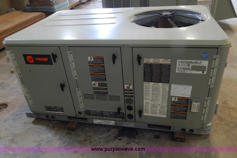 image for item H3419 Trane three ton rooftop AC and heating unit