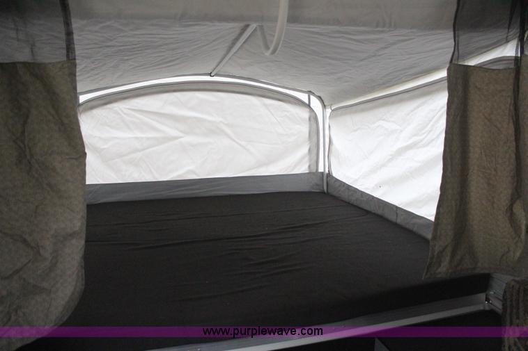 image for item H6112 2008 Fleetwood E3 popup camper