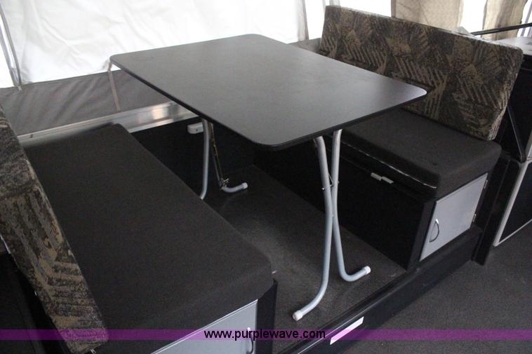 image for item H6112 2008 Fleetwood E3 popup camper