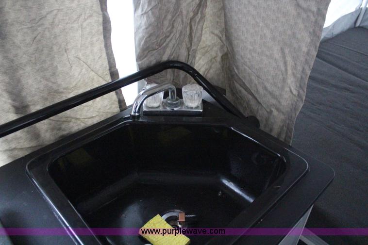 image for item H6112 2008 Fleetwood E3 popup camper