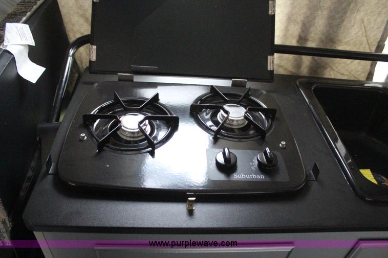 image for item H6112 2008 Fleetwood E3 popup camper