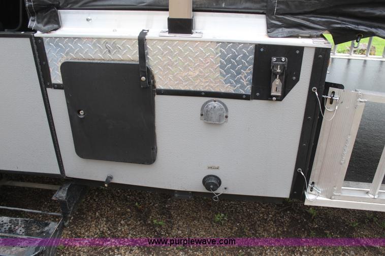 image for item H6112 2008 Fleetwood E3 popup camper