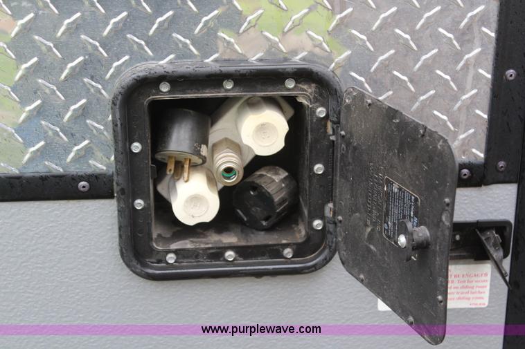 image for item H6112 2008 Fleetwood E3 popup camper