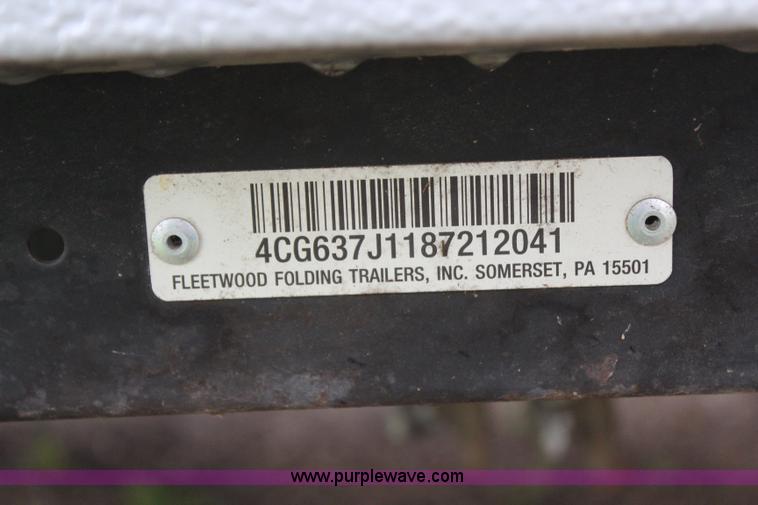 image for item H6112 2008 Fleetwood E3 popup camper