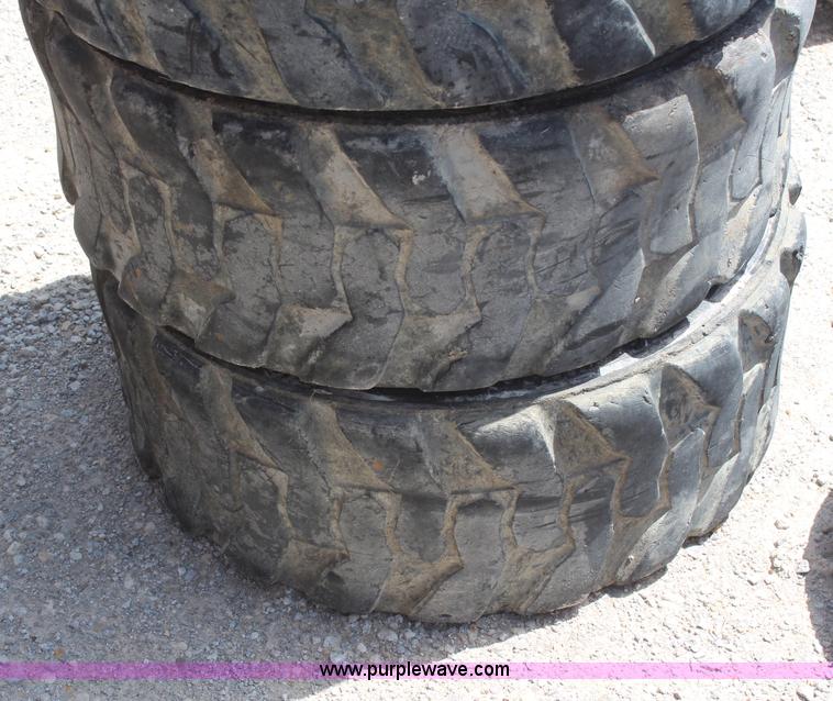 image for item AM9295 (4) 12-16.5 skid steer tires