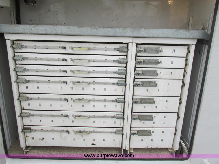 image for item AN9077 2004 Ford F550 Super Duty XL service truck with crane