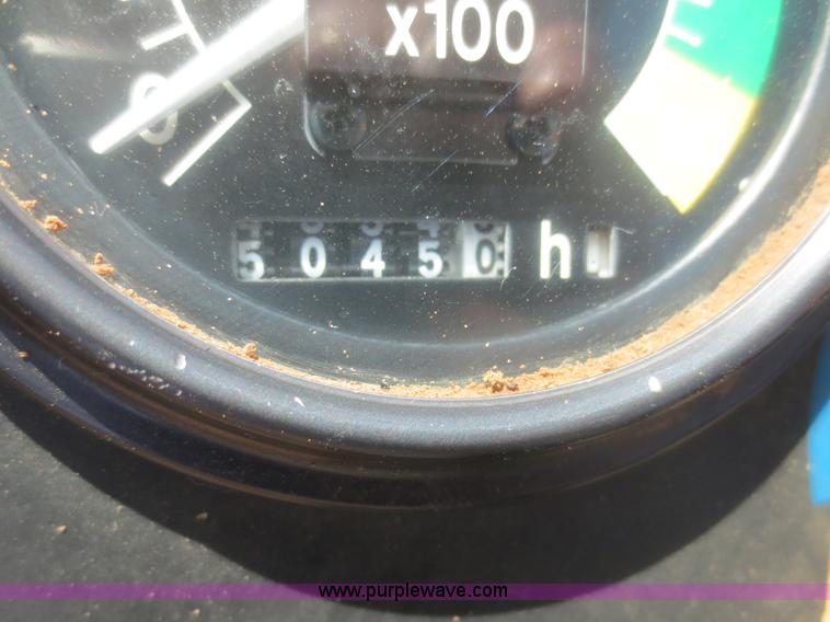 image for item F6906 1997 John Deere 310SE backhoe