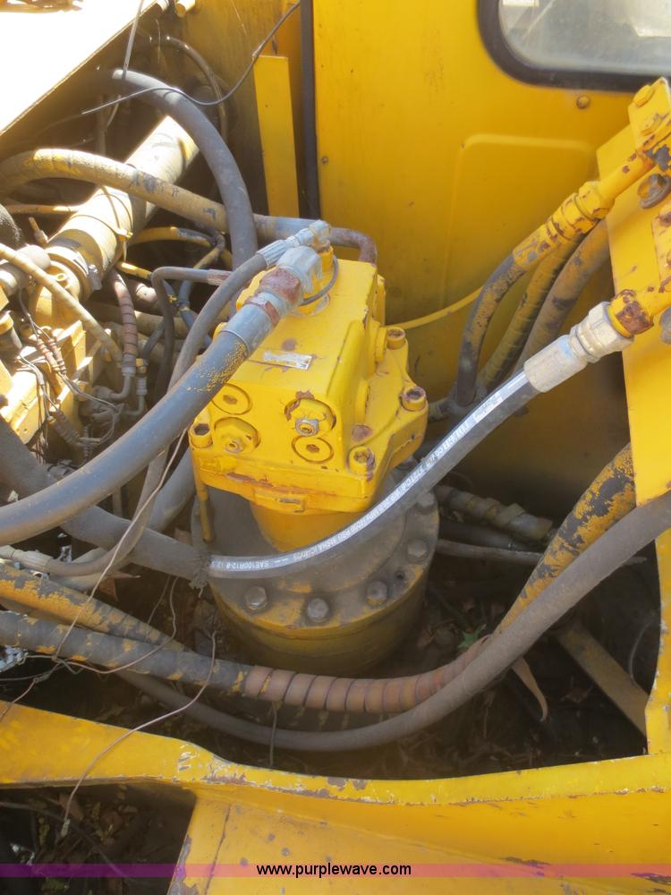 image for item F8265 1992 John Deere 590D excavator