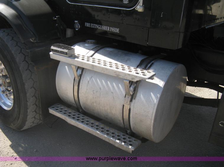 image for item G8281 2005 Kenworth T800 semi truck with knuckle boom crane and winch