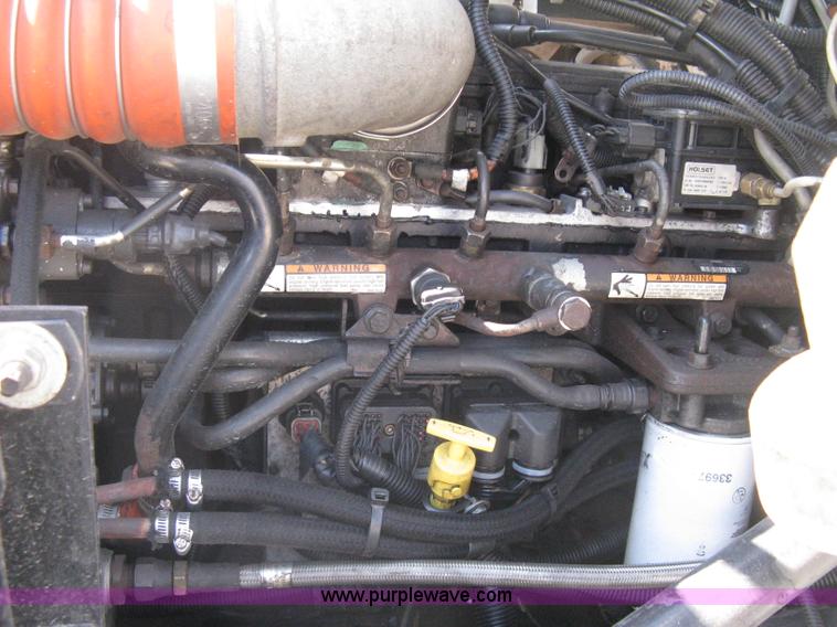 image for item G8281 2005 Kenworth T800 semi truck with knuckle boom crane and winch