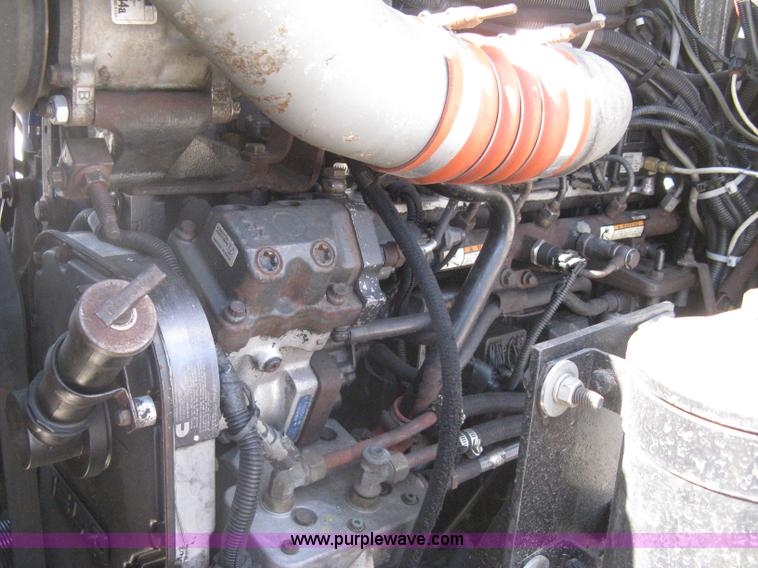 image for item G8281 2005 Kenworth T800 semi truck with knuckle boom crane and winch