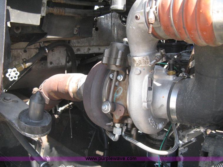 image for item G8281 2005 Kenworth T800 semi truck with knuckle boom crane and winch