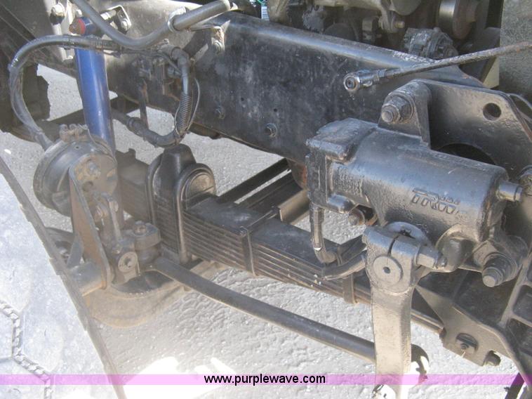 image for item G8281 2005 Kenworth T800 semi truck with knuckle boom crane and winch