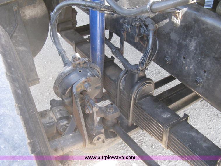 image for item G8281 2005 Kenworth T800 semi truck with knuckle boom crane and winch