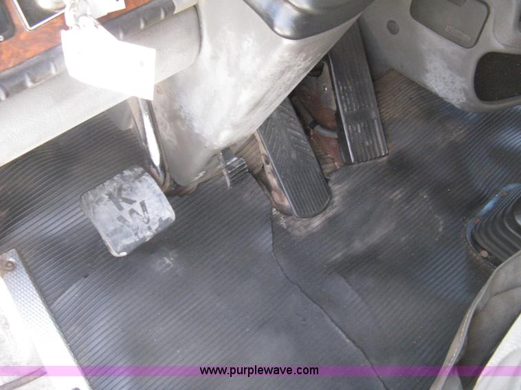 image for item G8281 2005 Kenworth T800 semi truck with knuckle boom crane and winch