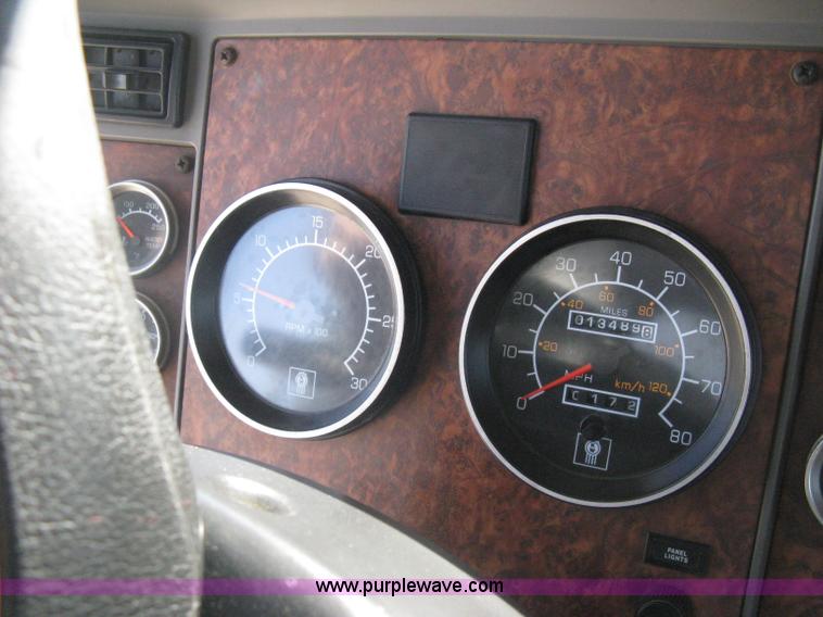 image for item G8281 2005 Kenworth T800 semi truck with knuckle boom crane and winch