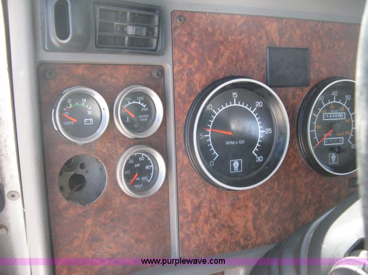 image for item G8281 2005 Kenworth T800 semi truck with knuckle boom crane and winch