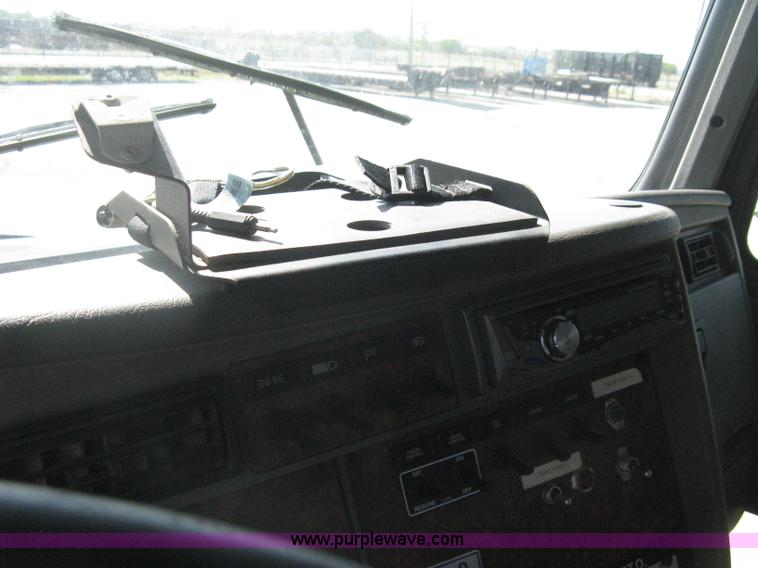 image for item G8281 2005 Kenworth T800 semi truck with knuckle boom crane and winch