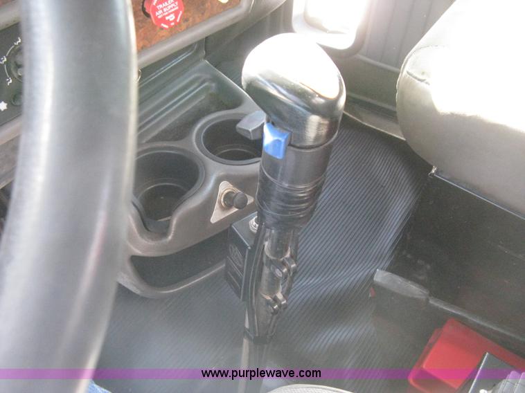 image for item G8281 2005 Kenworth T800 semi truck with knuckle boom crane and winch