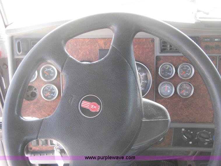 image for item G8281 2005 Kenworth T800 semi truck with knuckle boom crane and winch