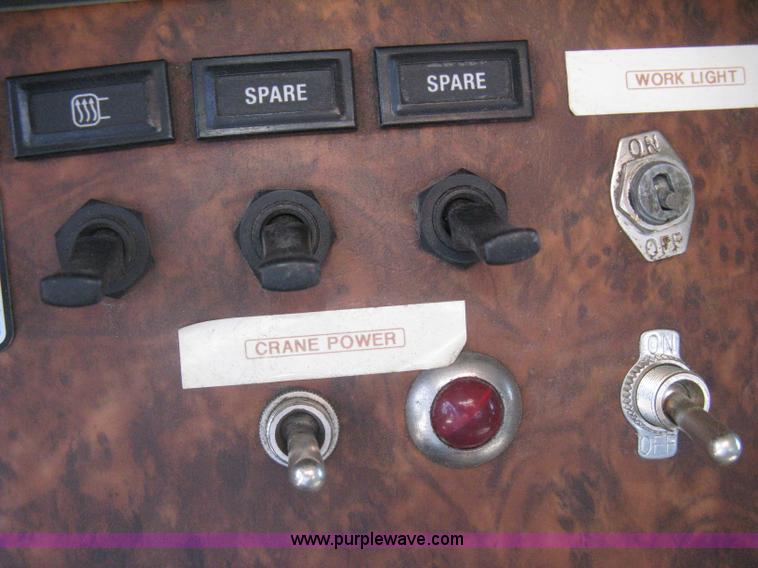 image for item G8281 2005 Kenworth T800 semi truck with knuckle boom crane and winch