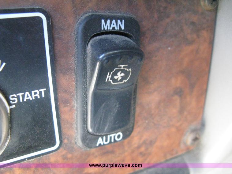 image for item G8281 2005 Kenworth T800 semi truck with knuckle boom crane and winch