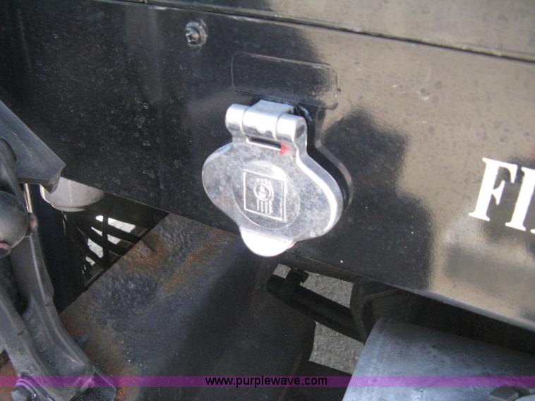 image for item G8281 2005 Kenworth T800 semi truck with knuckle boom crane and winch