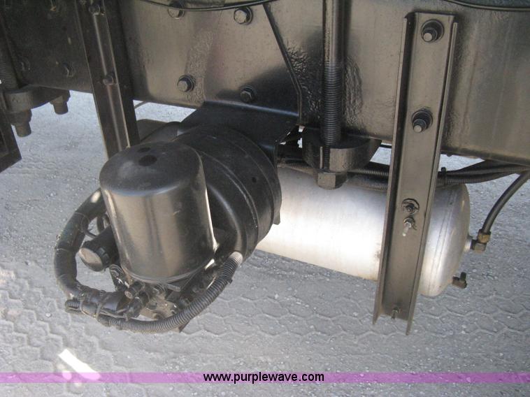 image for item G8281 2005 Kenworth T800 semi truck with knuckle boom crane and winch