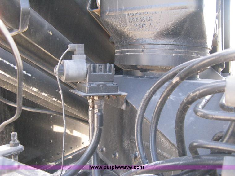 image for item G8281 2005 Kenworth T800 semi truck with knuckle boom crane and winch