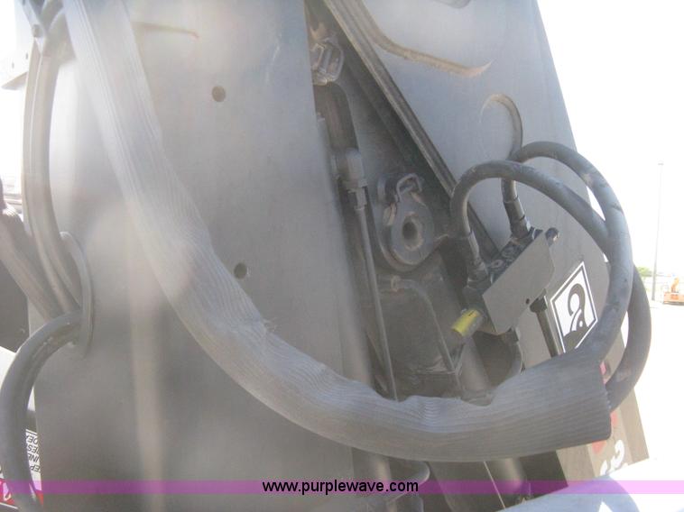 image for item G8281 2005 Kenworth T800 semi truck with knuckle boom crane and winch