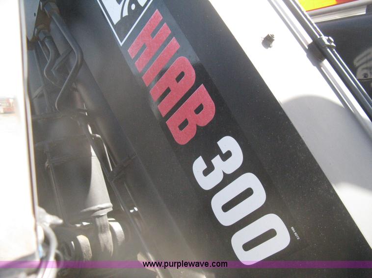 image for item G8281 2005 Kenworth T800 semi truck with knuckle boom crane and winch