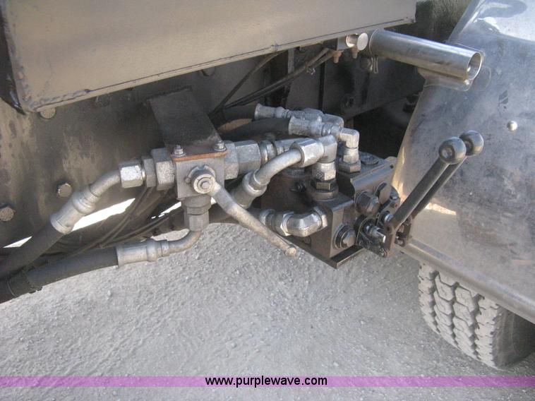 image for item G8281 2005 Kenworth T800 semi truck with knuckle boom crane and winch