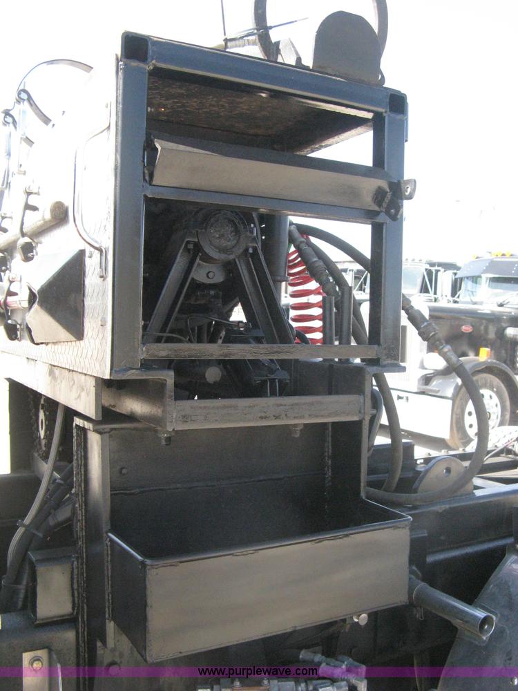 image for item G8281 2005 Kenworth T800 semi truck with knuckle boom crane and winch