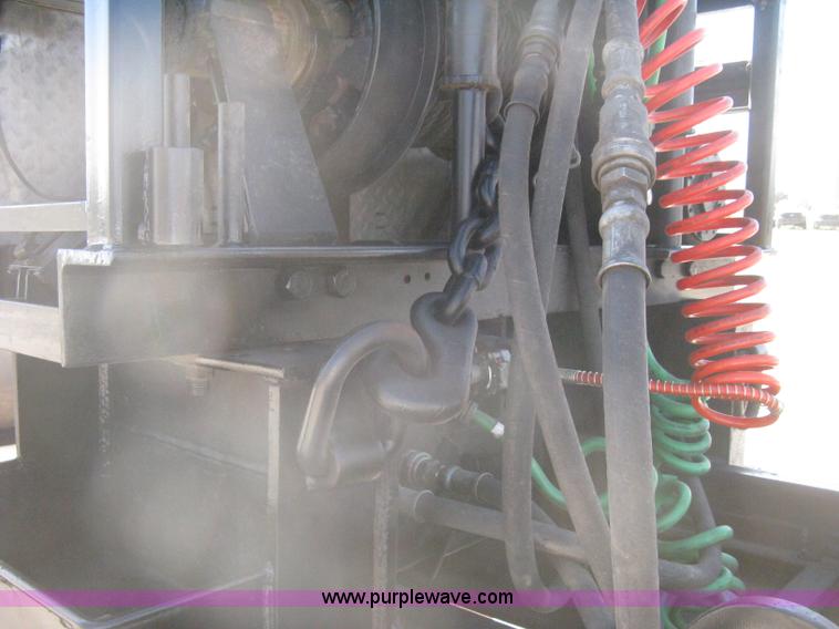 image for item G8281 2005 Kenworth T800 semi truck with knuckle boom crane and winch