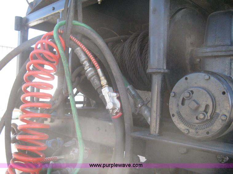 image for item G8281 2005 Kenworth T800 semi truck with knuckle boom crane and winch