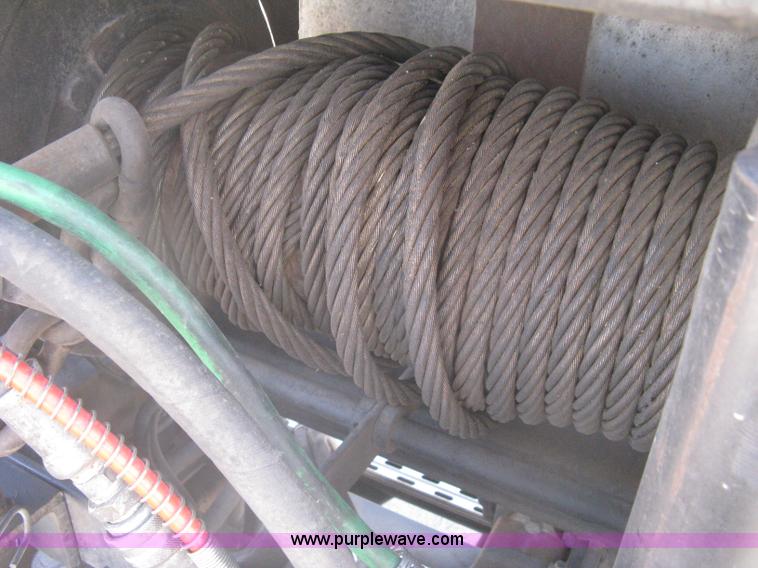 image for item G8281 2005 Kenworth T800 semi truck with knuckle boom crane and winch