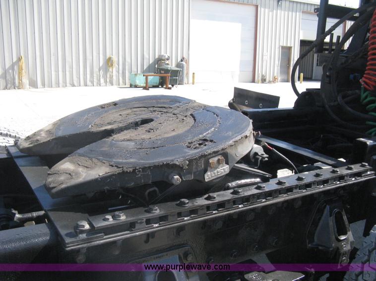 image for item G8281 2005 Kenworth T800 semi truck with knuckle boom crane and winch