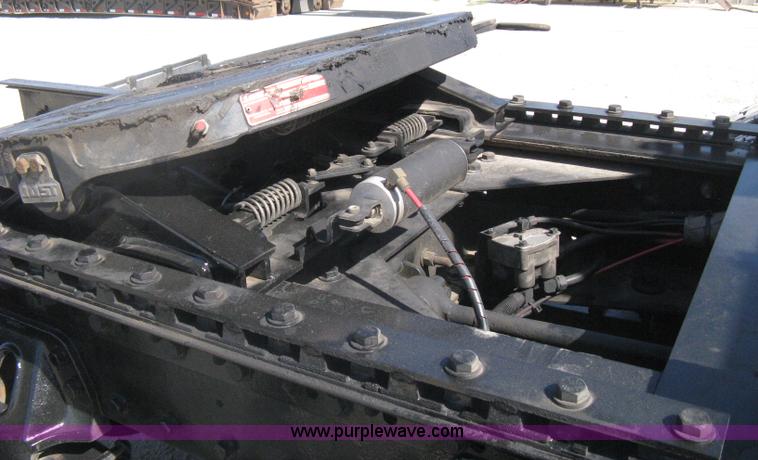 image for item G8281 2005 Kenworth T800 semi truck with knuckle boom crane and winch