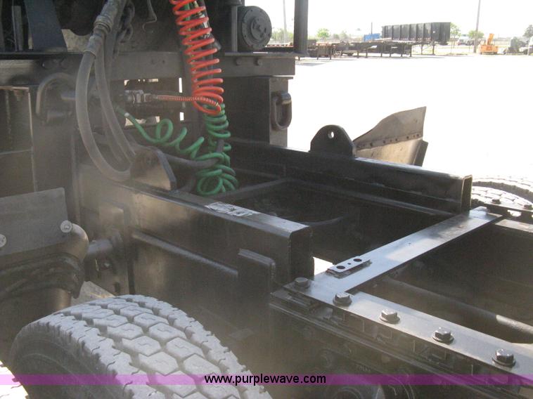 image for item G8281 2005 Kenworth T800 semi truck with knuckle boom crane and winch