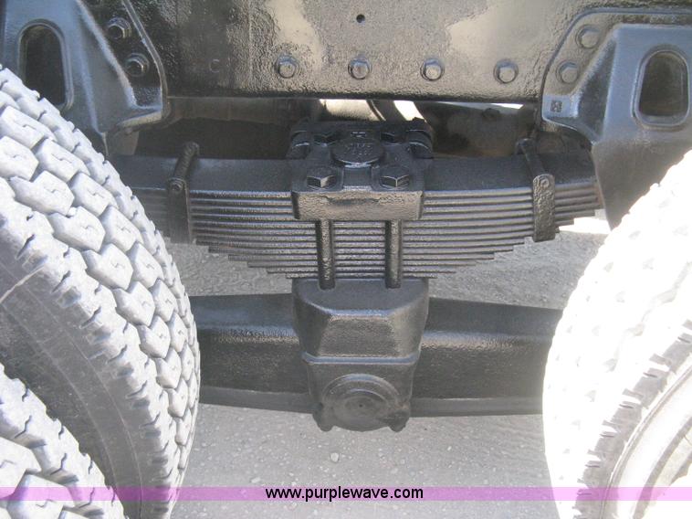 image for item G8281 2005 Kenworth T800 semi truck with knuckle boom crane and winch