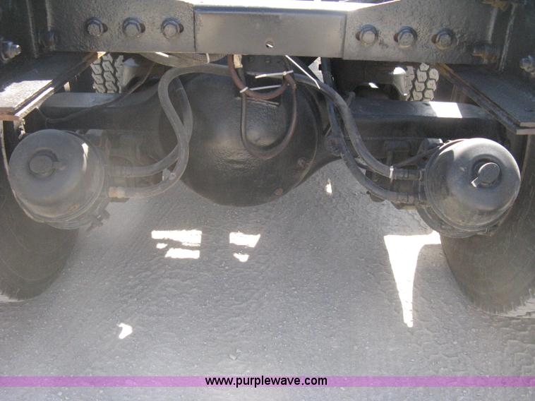 image for item G8281 2005 Kenworth T800 semi truck with knuckle boom crane and winch