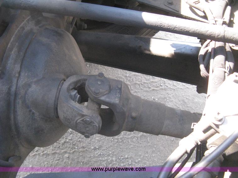 image for item G8281 2005 Kenworth T800 semi truck with knuckle boom crane and winch